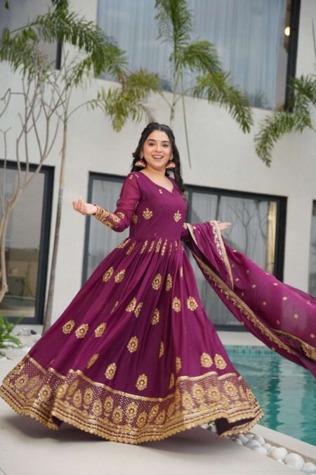 Womenโs Ethnic Anarkali Style Floor-Length Gown in Magenta with Golden Zari Embroidery โ Festive & Wedding Wear